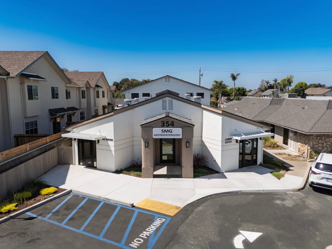 Front view of SMG Gastroenterology building at 354 with clear signage and parking area.