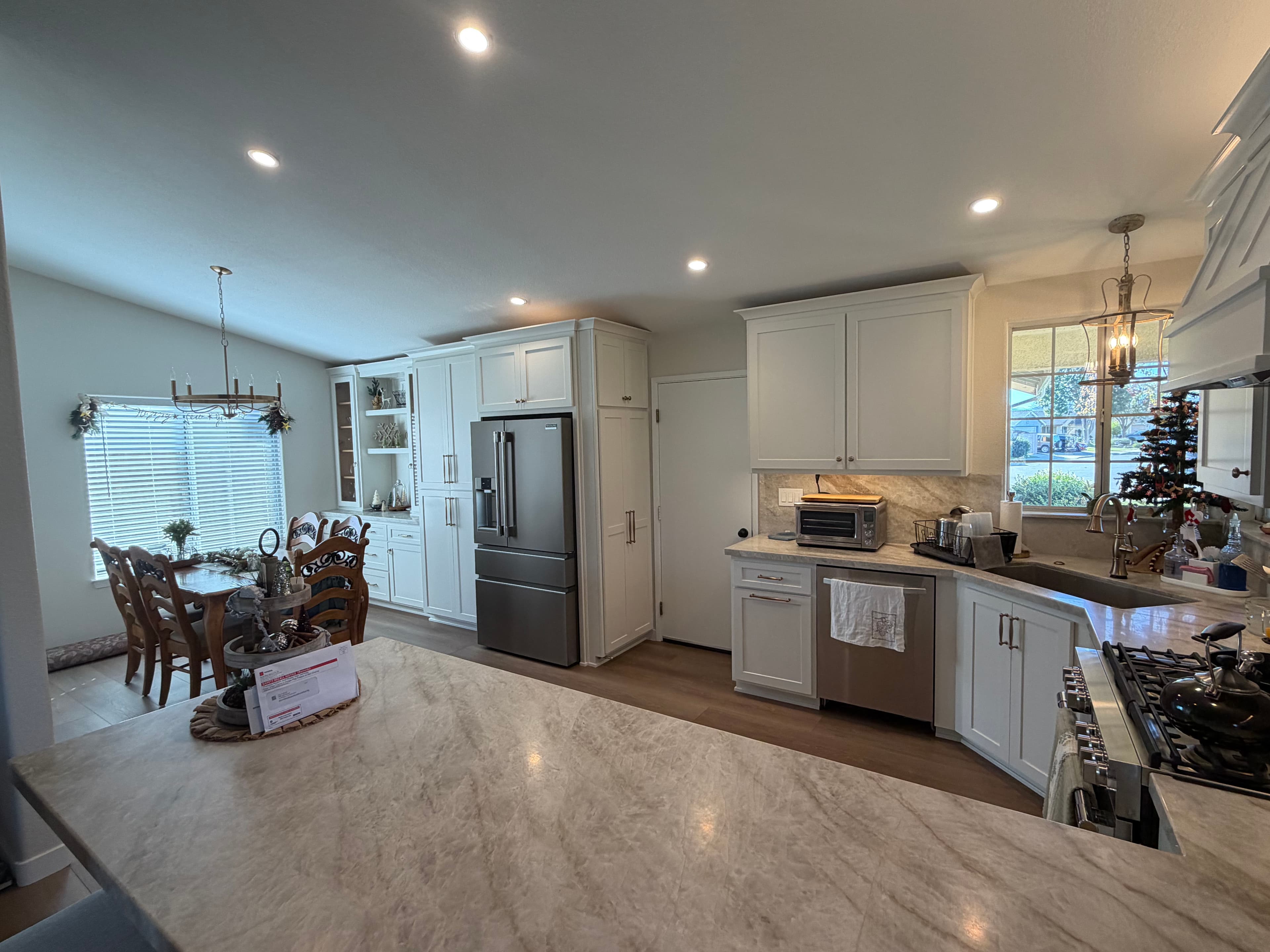 Project Classy Kitchen Remodel with White Cabinets and Quartzite Countertops image