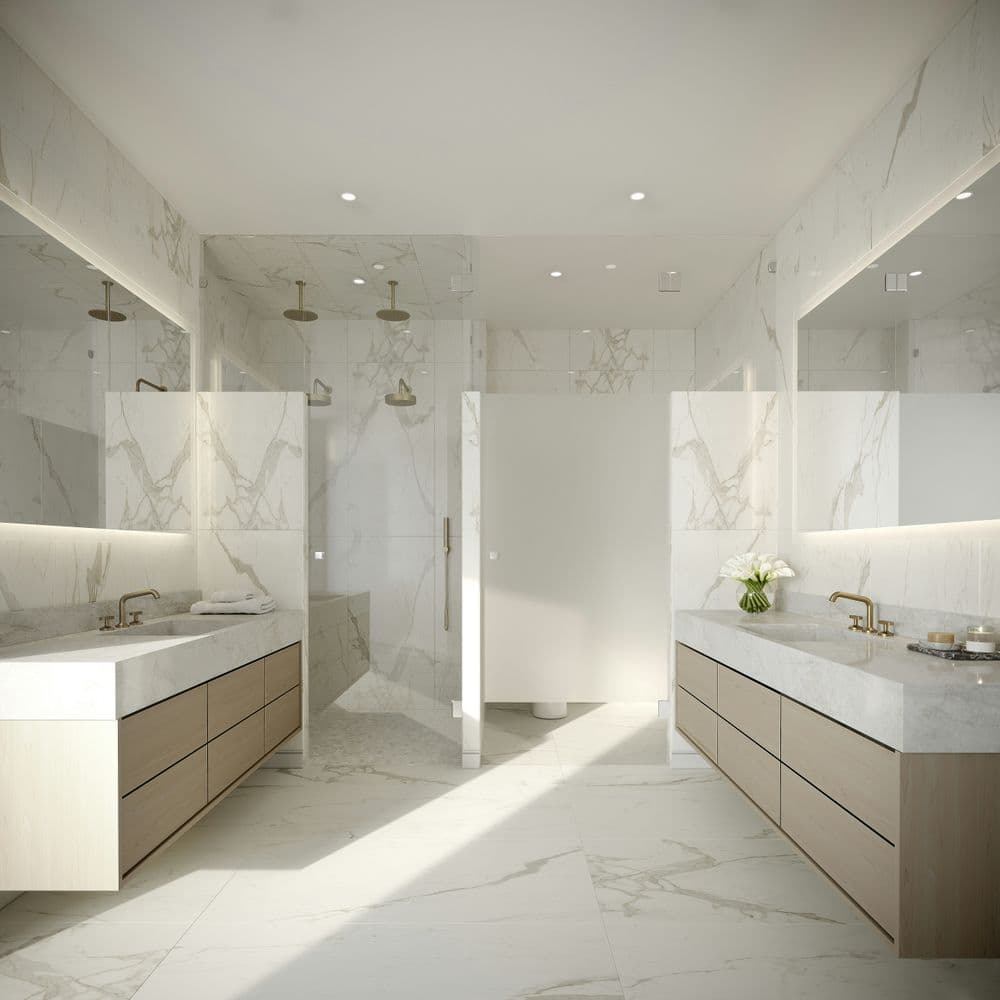 Modern luxury bathroom with white marble walls, dual sinks, and stylish fixtures.